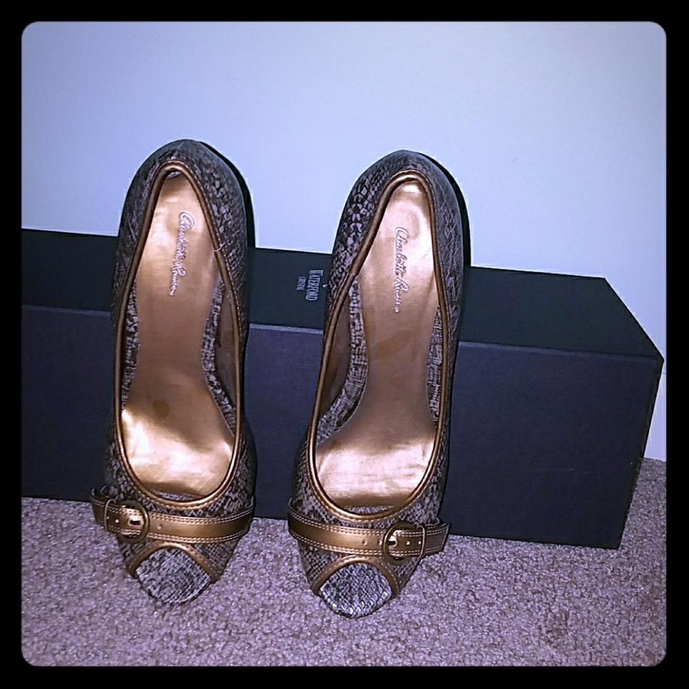 Black, white, and gold shoes.. size 9